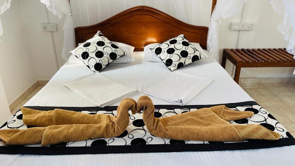 ซันนี มู้ด เกสท์เฮาส์ Bed & Breakfast อูนาวาตูนา ภายนอก รูปภาพ